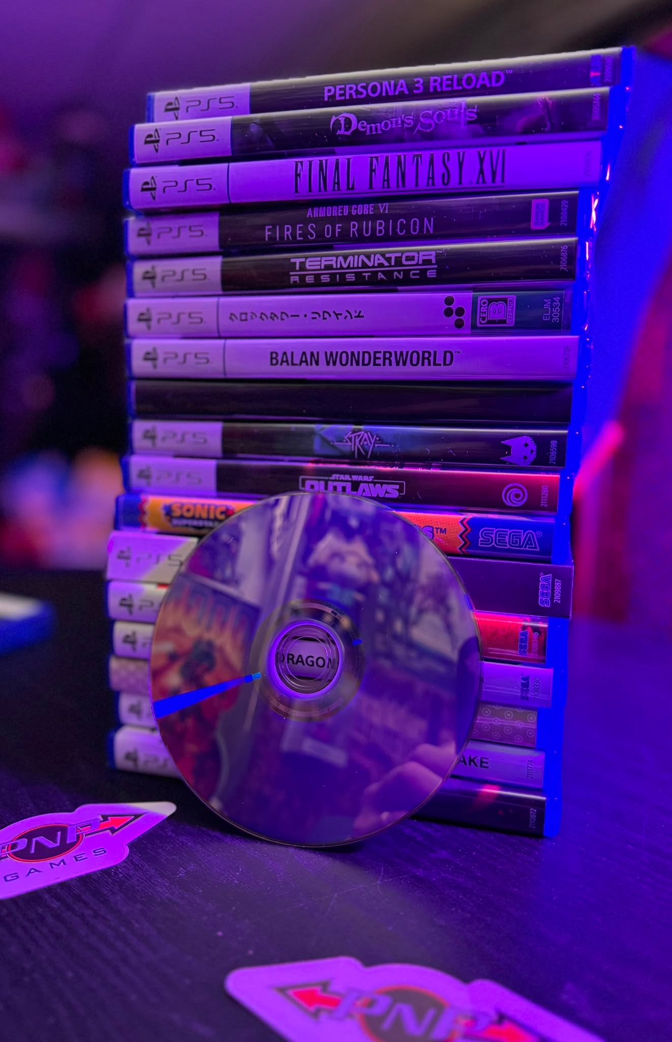 Pile of physical game packages and disc's